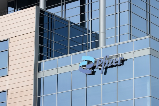 Pfizer ups profit forecast as cost cuts begin to take effect